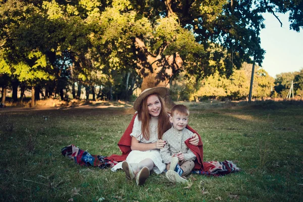 A series about happy red-haired. The elder sister and younger brother and sister. Park, autumn, river