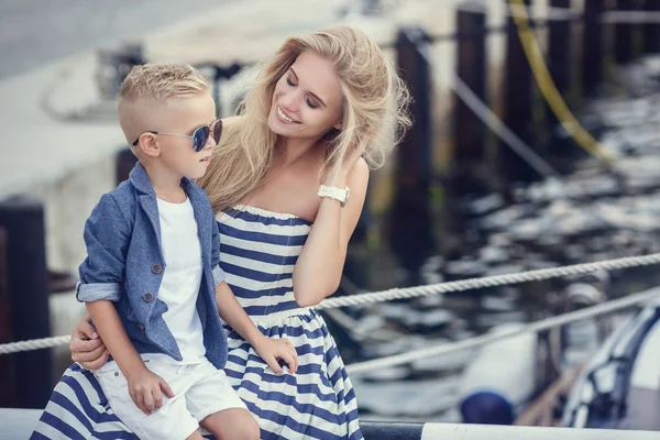 The elder sister and younger sisters and a brother in a marine s — Stock Image The elder sister and younger sisters and a brother in a marine s Stock Photo