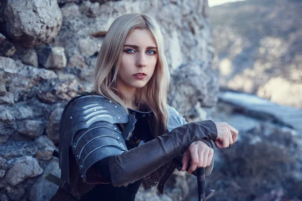 The cute female warrior attacking with sword — Stock Photo, Image