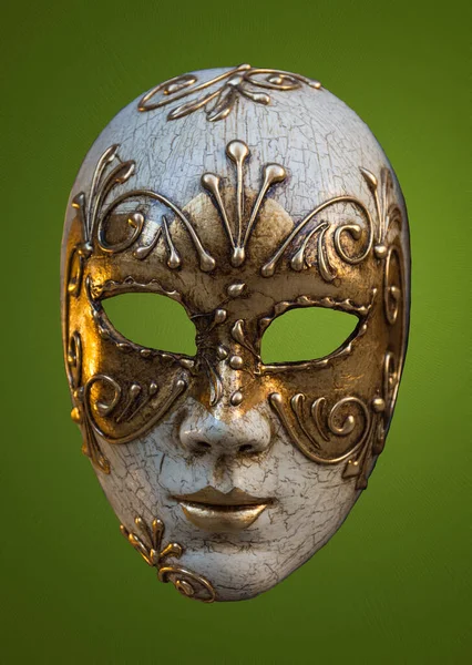 Traditional Venetian mask on the streets of Venice, Italy, isolated on colorful background.