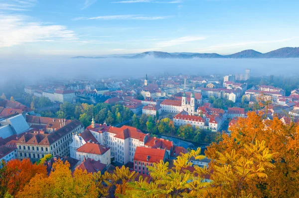 Cityscape of Graz with Mur river and Mariahilfer church (Mariahilferkirche), view from the Shlossberg hill, in Graz, Styria region, Austria