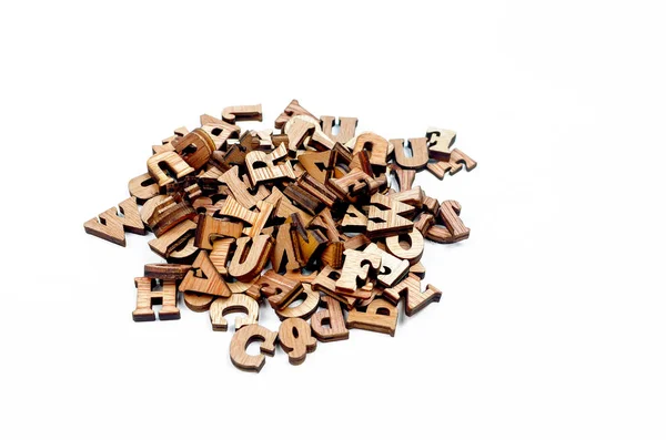 Pile Scattered Mixed Brown Wooden Letters English Alphabet White Background — Stock Photo, Image