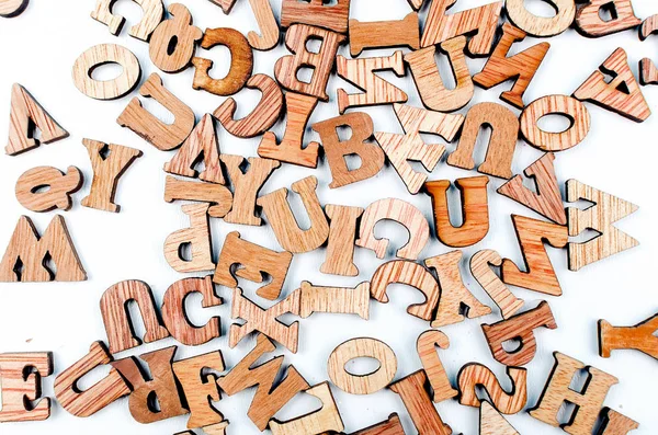 Gemengde Bruin Houten Letters Van Het Standaard Engelstalige Alfabet Verspreid — Stockfoto