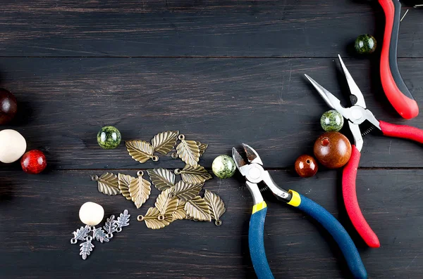 Tools for handmade jewelry. Beads, plier and wire — Stock Photo, Image
