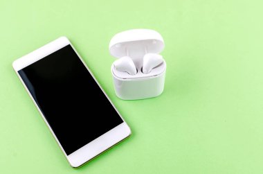 Airpods wireless headphones with phone clipart