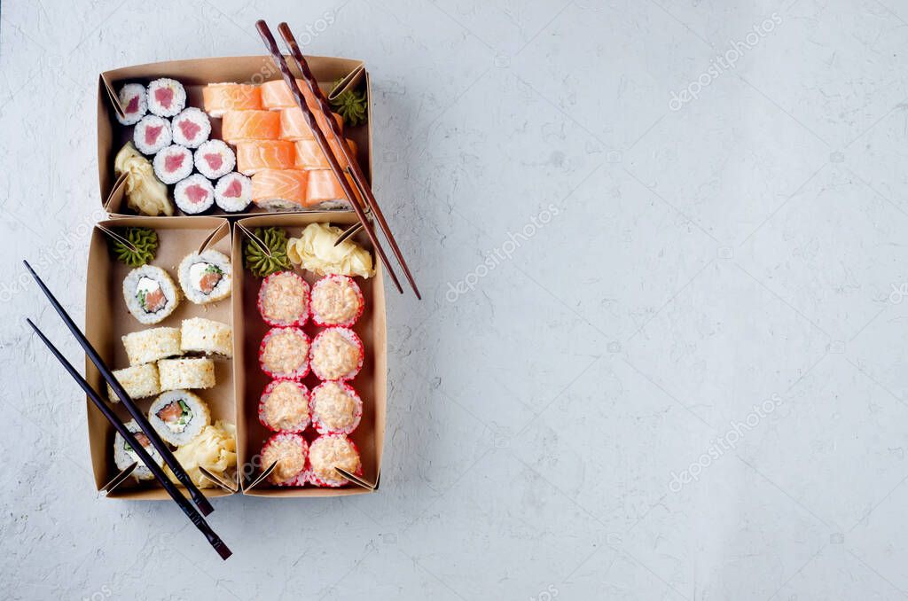 Download Tasty Sushi Rolls In Disposable Kraft Paper Boxes Sauce On Dark Table Concept Delivery Service Japan Food In Eco Container Flat Lay Template Mockup With Place For Text Zero Waste Packaging 392122088