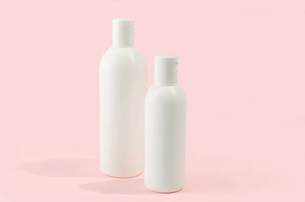 Two Cosmetic Bottles Pink Background Set Cosmetic Products Cream Balsam — Stock Photo, Image