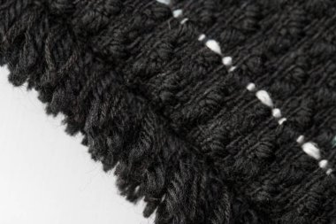 Siyah beyaz ipliklerden, desenlerden, arkaplandan yapılmış çok renkli Jacquard kumaşı