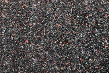 Duvarın dokuları, renkli granit parçacıkları, arka plan.