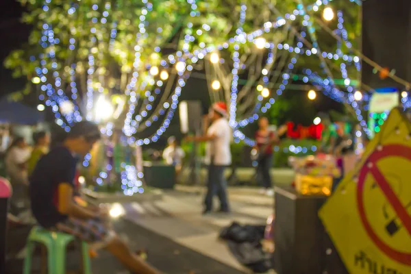 Imagen borrosa del festival nocturno en la calle — Foto de Stock