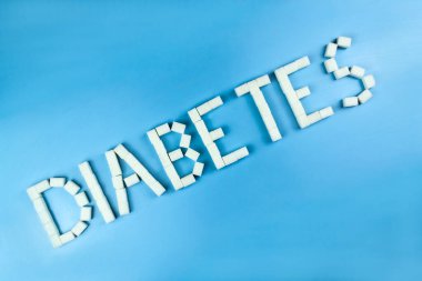 Şeker küpleriyle yazılmış şeker hastalığı. Dünya Diyabet Günü konsepti