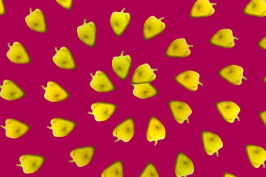 Burgundy arka planında yeşil ve sarı biberli kusursuz desen. Sebze deseni. Soyut arkaplan. En az sebze konsepti.