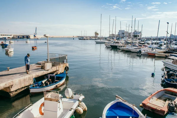 BARI, ITALY - 07 FEBRUARY, 2018: Evening view of marina with different Fishing boats in small port Giovinazzo near Bari, Apulia, Italy — Stock Photo, Image