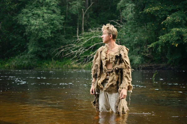 Young Medieval Man Sacking Clothes Stock Image