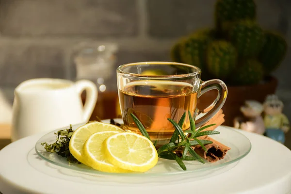 Herbal tea with tea leaves, dried chrysanthemum, pea flowers, favoring with cinnamon and lemon. Herbal tea mostly use for prevents cold and moisten the throat.