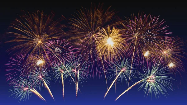 Colorful fireworks celebration and the twilight sky background. — Stock Photo, Image