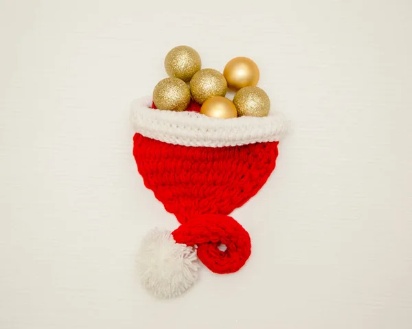 Christmas Balls Red Santa Claus Hat Light Wooden Background View — Stock Photo, Image