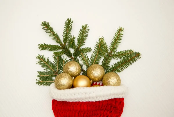 Christmas Composition Balls Fir Branches Santa Claus Hat White Wooden — Stock Photo, Image