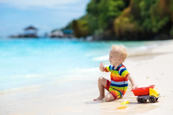 Child Playing Tropical Beach Little Boy Digging Sand Sea Shore — Stock Photo, Image