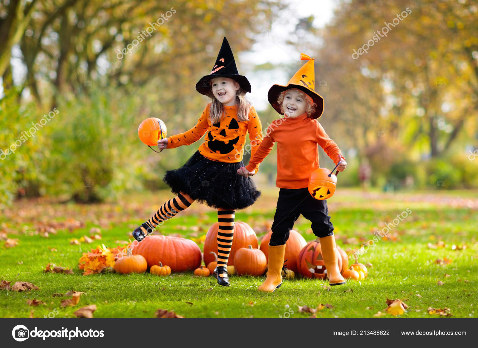 orange and black witch costumes