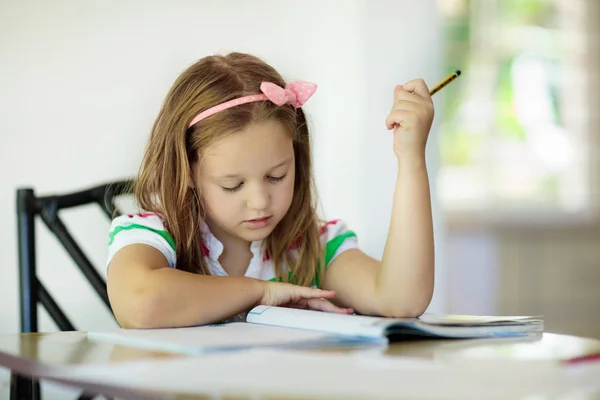 Cute Little Girl Doing Homework Reading Book Coloring Pages Writing Royalty Free Stock Photos