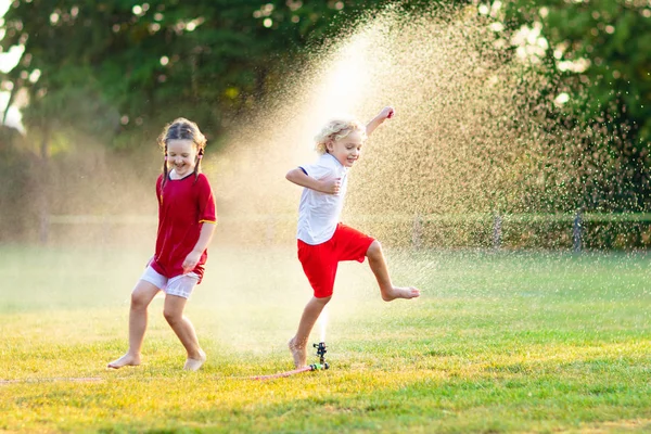 Kids Play Water Hot Summer Day Children Garden Sprinkler Outdoor — Stock Photo, Image