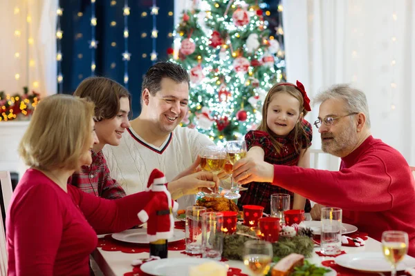 Family Children Eating Christmas Dinner Fireplace Decorated Xmas Tree Parents — Stock Photo, Image