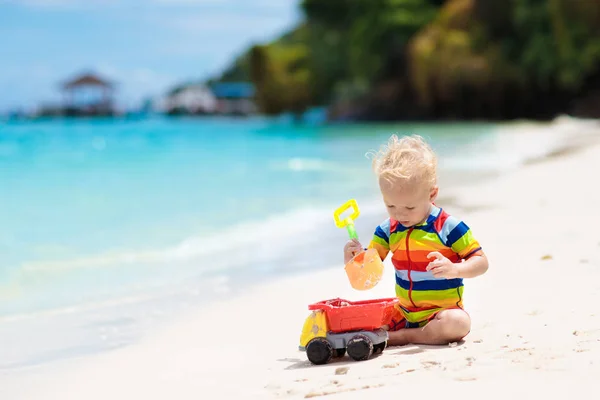 Child Playing Tropical Beach Little Boy Digging Sand Sea Shore — Stock Photo, Image