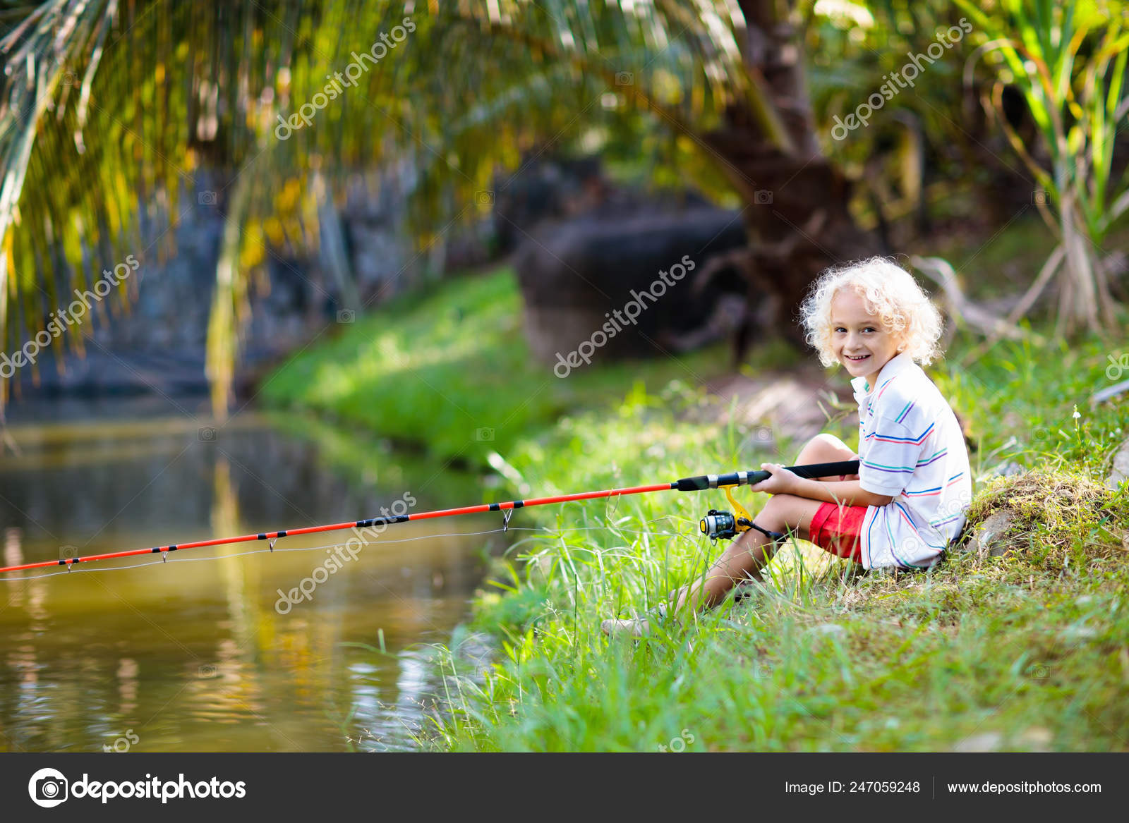 Boy Fishing Child Red Rod Catching Fish River Sunny Summer Stock