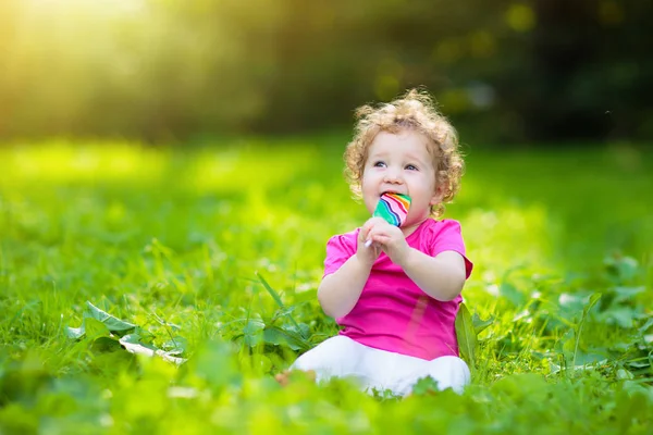 Baby Girl Eating Ice Cream Candy Sunny Park Child Lollipop — Stock Photo, Image