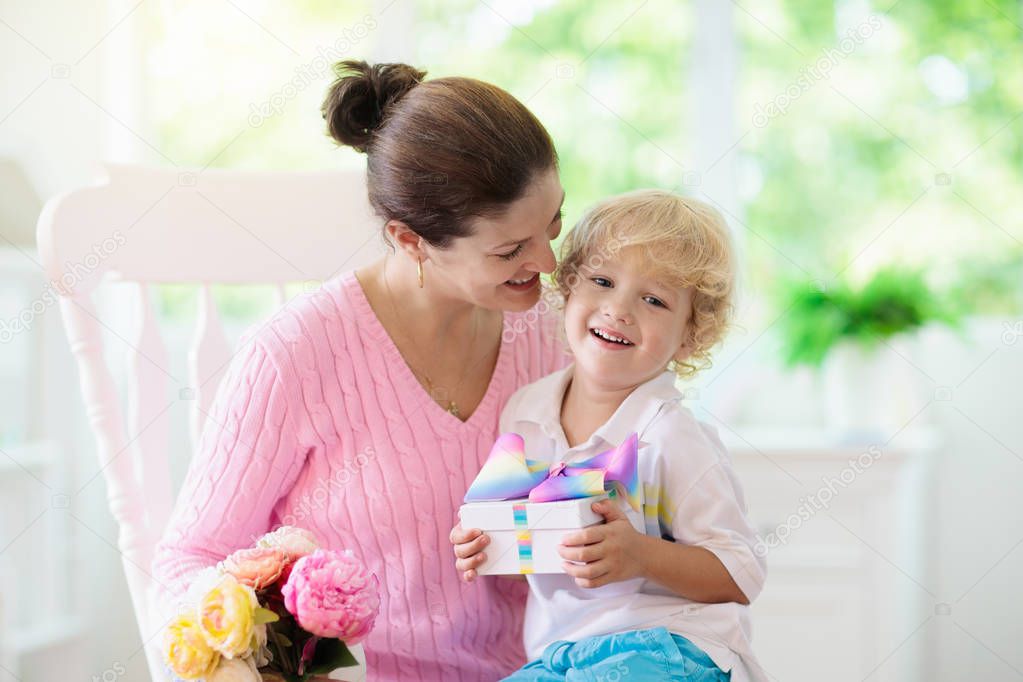 Happy mother���s day. Child with present for mom.