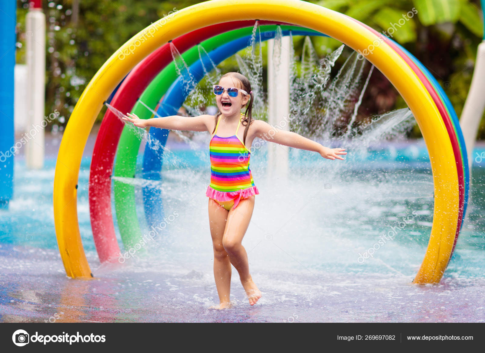 Water Park Girls Pool Slides A Little Girl Near The Water Slide In