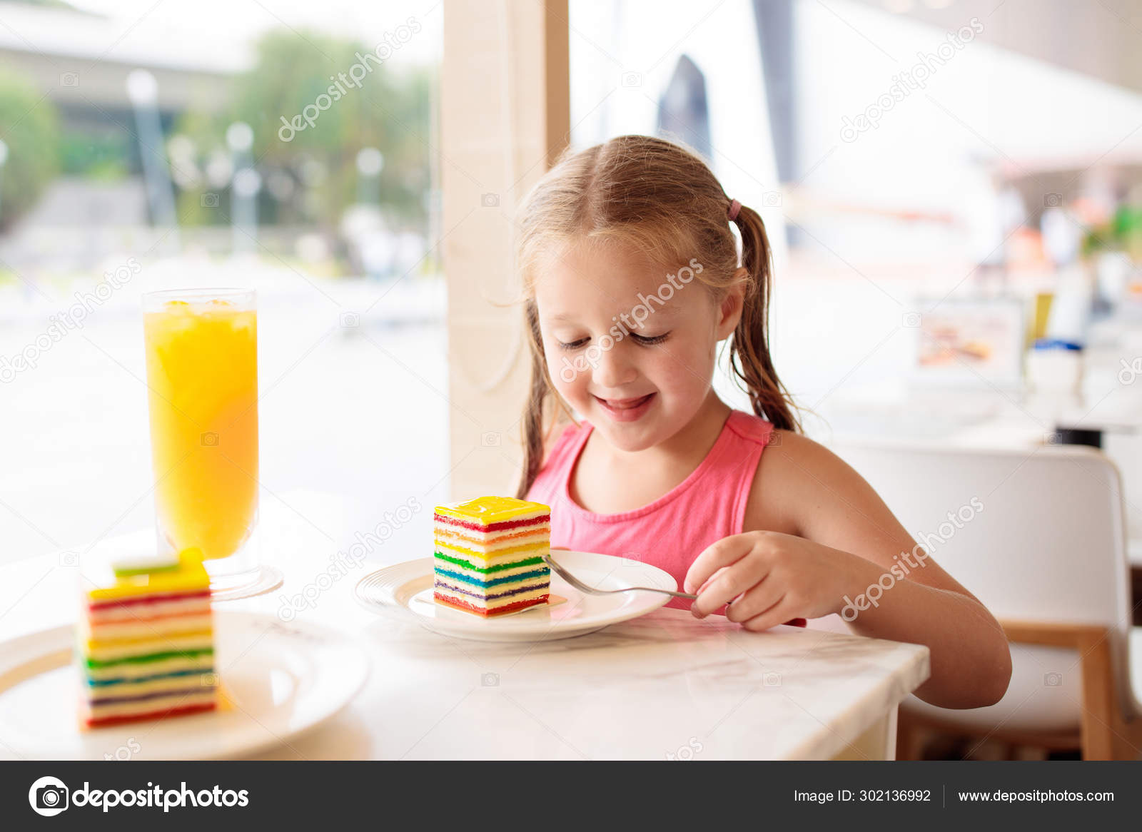 Kids Eat Cake At Restaurant Little Girl In Cafe Stock Photo