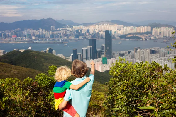 Family hiking in Hong Kong mountains