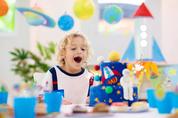 Kids space theme birthday party with cake. — Stock Photo, Image