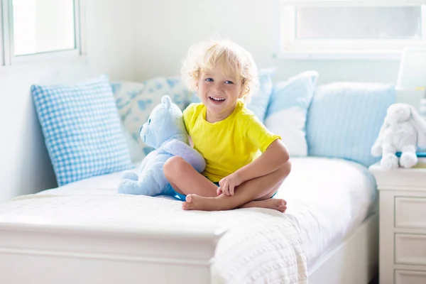 Child Playing Bed White Sunny Bedroom Window Kids Room Interior — Stock Photo, Image