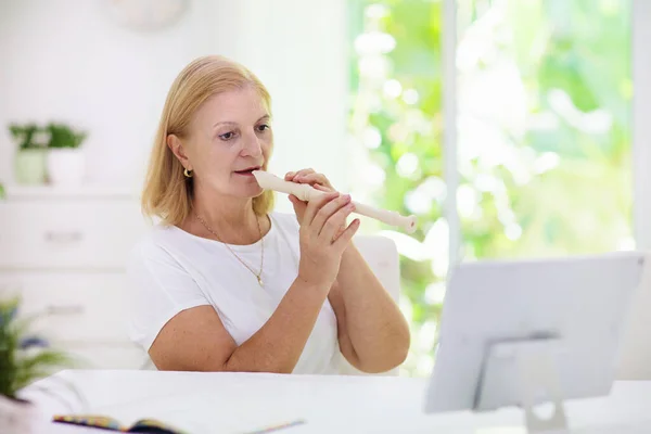 Teacher Playing Flute Front Computer Online Music Tuition Remote Learning — Stock Photo, Image