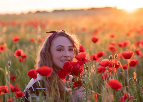 poppy field at sunset blonde woman