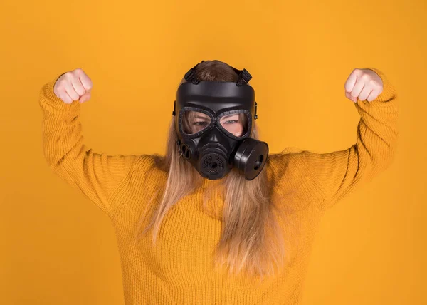 Woman Gas Mask Raises Her Fists Orange Background — Stock Photo, Image