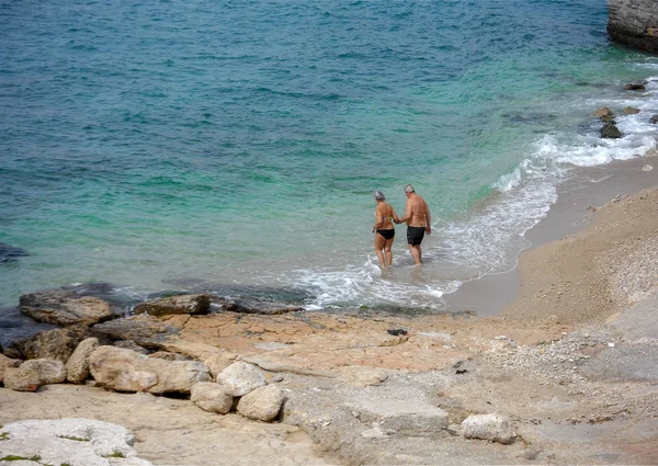 Elderly Couple Going Swimming Small Beach Piraeus City Greece Royalty Free Stock Images