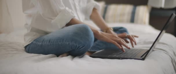 Woman Hands Typing Something Laptop Keyboard Bedroom Slow Motion Shallow — Stock Video