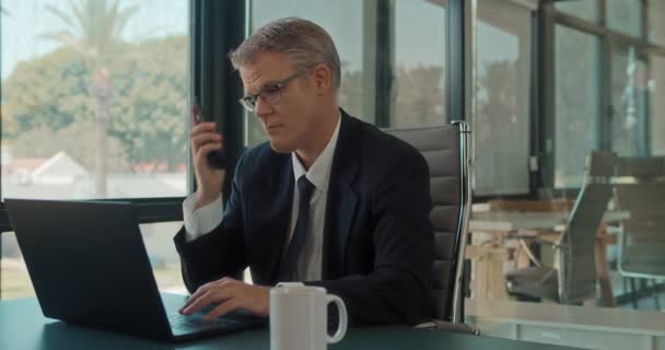 Businessman Talking Phone While Working Laptop Office Tracking Medium Shot — Stock Video