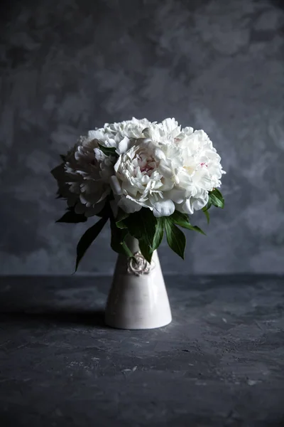 Beautiful peonies on grey concrete background. Wedding, birthday, valentine's day, gift — Stock Photo, Image