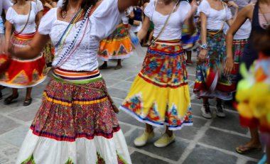Maracatu dancers on the street, performing during the Carnival clipart