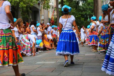 Maracatu dancers on the street, performing during the Carnival clipart