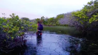 Walking through the lagoons in Lencois Maranhenses