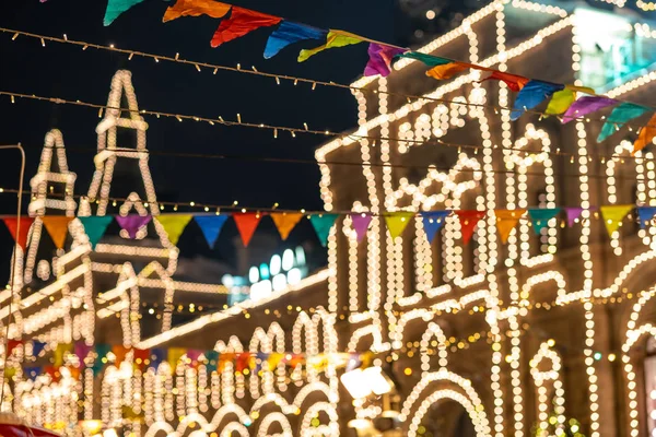 Noel aydınlatma bulanık bokeh arka plan şeklinde