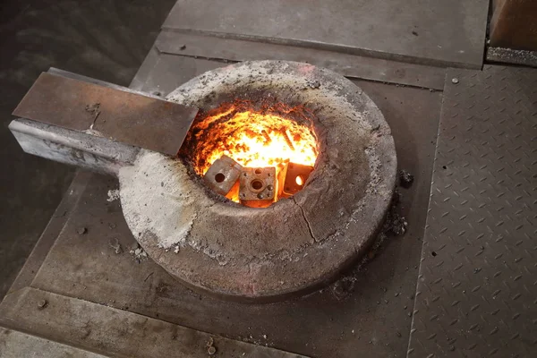 Foundry Process-Process Of Melting Metals At High Temperatures In Electric Metal Foundry Close Up
