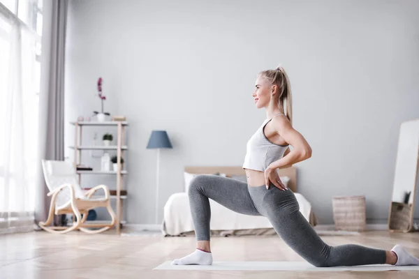 Woman working stretching at home.