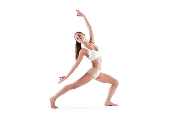 Woman working yoga exercise, full-length portrait, isolated on white. Balance and meditation. — Stock Photo, Image